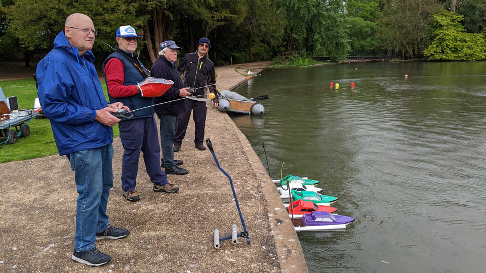 Members of the Model Boat Association Dover sailing their boats on Kearsney Abbey lake.